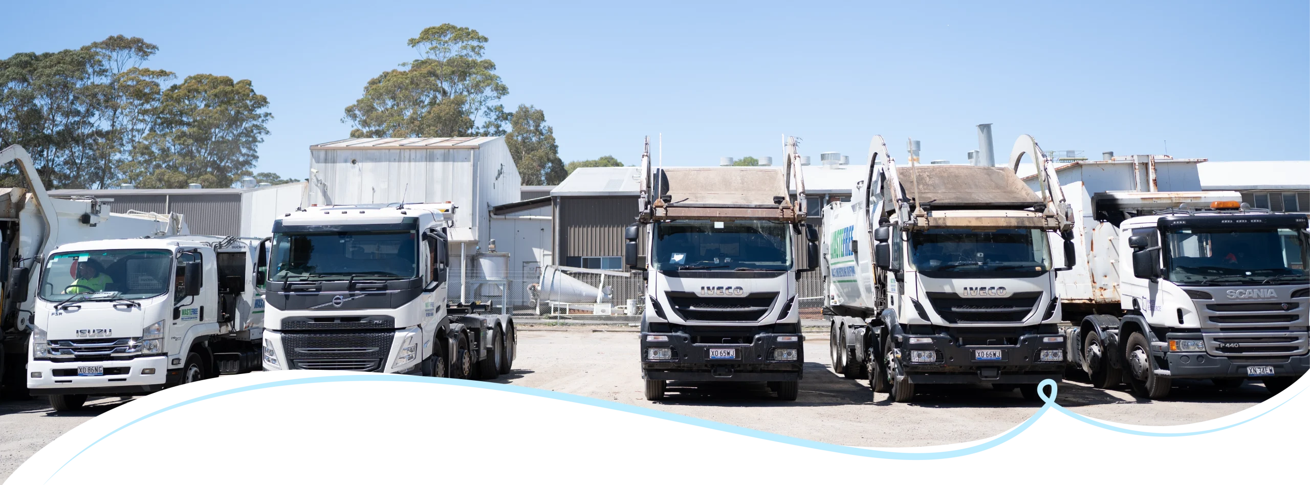 Waste-free grease trap servicing and liquid waste vacuum truck operating at a commercial kitchen facility.