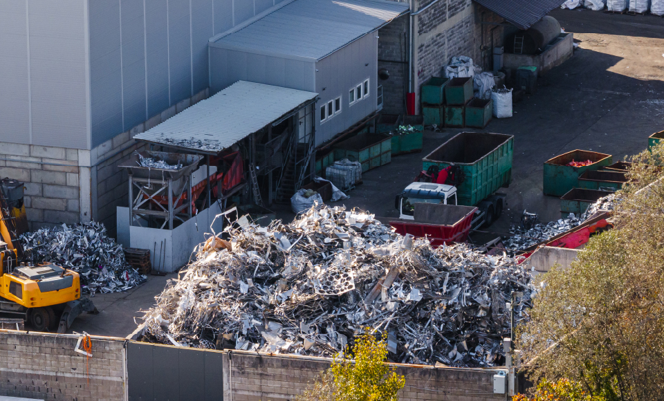 Commercial and industrial waste materials including packaging, pallets, plastics, manufacturing by-products and warehouse waste prepared for sorting and recycling.
