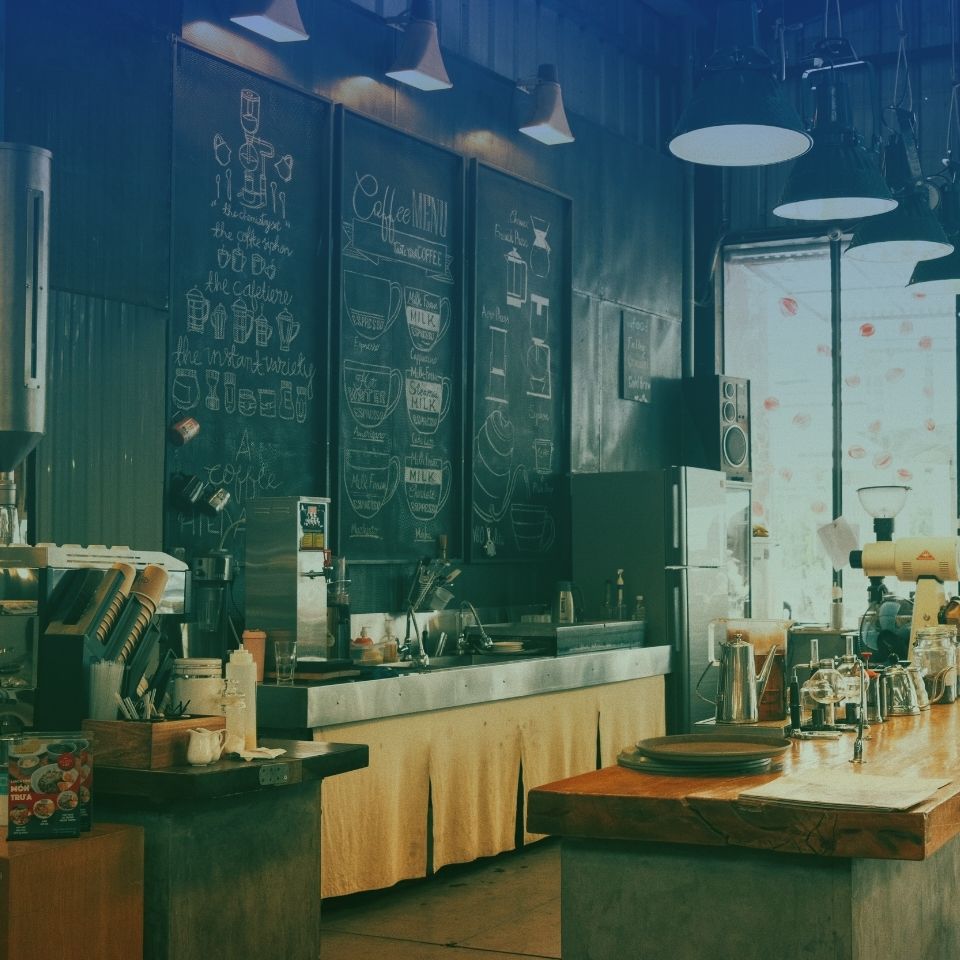 Commercial café kitchen producing organic food waste for recycling services in hospitality sector